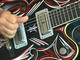 Brian Setzer on rockabilly picking using barre chords